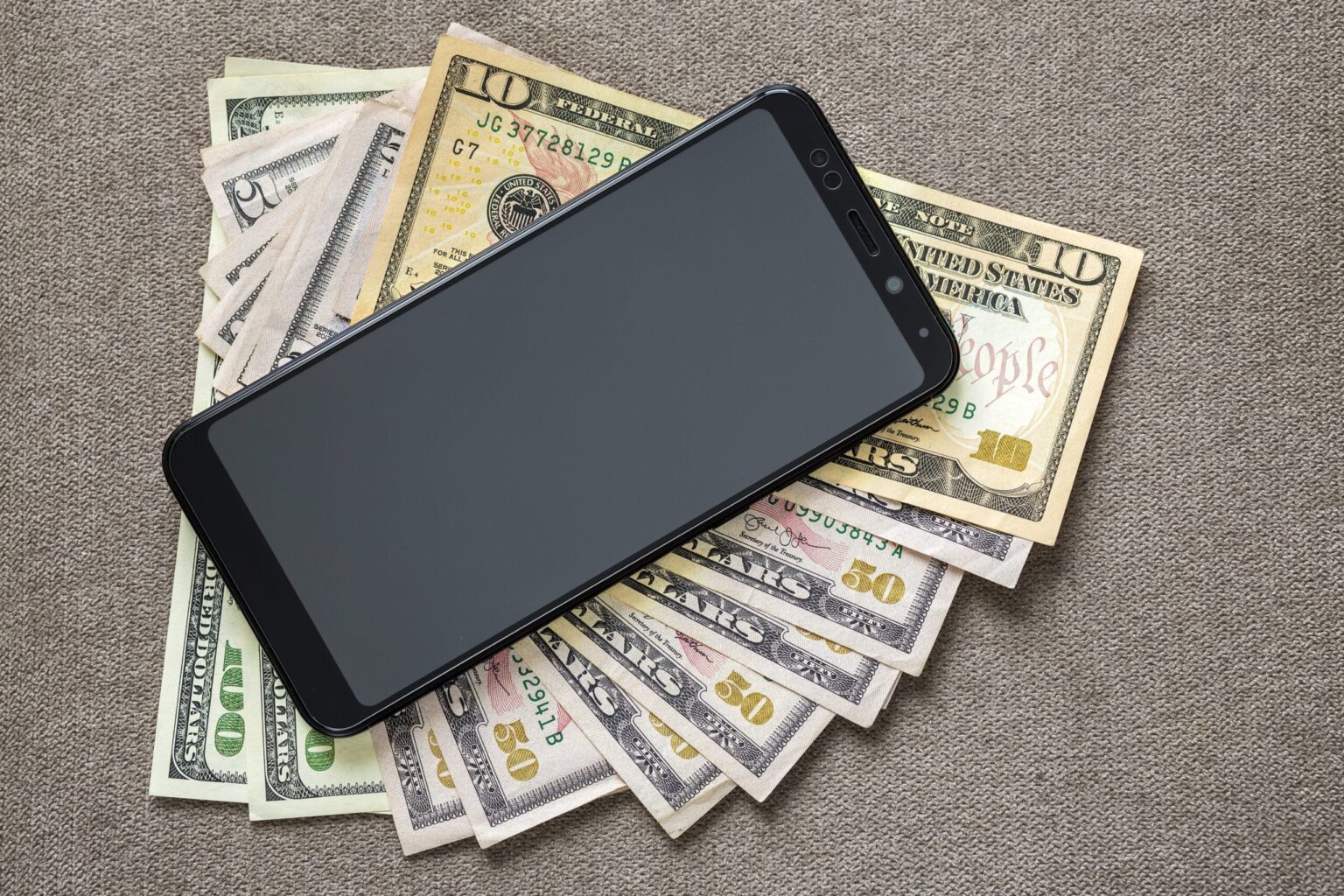 A Phone on top of money