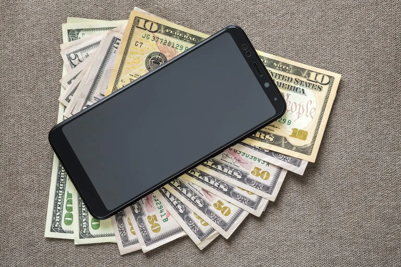 A Phone on top of money