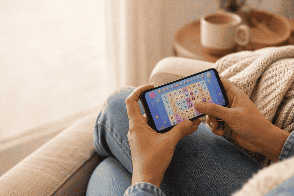 Bingo games that pay cash shown on a phone daubing a bingo card